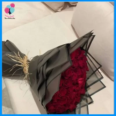 Elegant Red Rose Bouquet in Black Wrap | Premium Flower Delivery Karachi